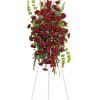 This elegant, all-red funeral spray conveys compassion and deep devotion. 

DETAILS
Features a