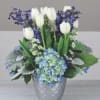 Soft blues and fresh whites are gathered carefully in this sweet and