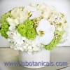 This lush bouquet includes bounty of premium white flowers, gathered together and