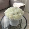 Due to current supply shortages, some substitutions of flowers and containers (hat