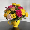 Spread joy and positivity with vibrant bouquet, featuring bright blooms arranges to