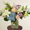 The calming blue hydrangea is the perfect summer pair for the peach