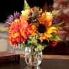 Sunflower, coffee berry, hydrangea, spider mum, seeded eucalyptus and tinted fern