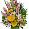 Large floral arrangement of Vibrant sunflowers, pink snapdragons, white lilies, solidago, bells