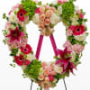 Beautiful floral tribute- heart with green kermit poms hot pink oriental lilies