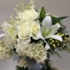 Striking white floral vase arrangement. Simply perfect for 
many occasions.
