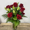 
Introducing the &quot;Tower of Rose Richness&quot;! This stunning arrangement features a dozen