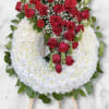 Beautifully crafted wreath to honor the memory of a beloved individual. Created
