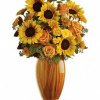 Enjoy this wonderful fresh floral vase filled with autumn colors and lush