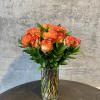 24 Premium Grade A Ecuadorian Roses arranged with greenery. Please specify color
