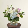 The calming blue hydrangea is the perfect summer pair for the peach