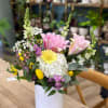 Brighten their day with the Sunrise Bliss Bouquet! This radiant arrangement features