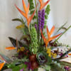 Liven up your living space with this lovely tropical bouquet! This artfully