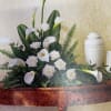 This arrangement is for Sympathy and Funeral&#039;s.  This arrangement contains roses