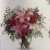 This is a gorgeous arrangement that expresses love in a special way.