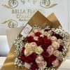 Red and pink roses beautifully arranged with gold butterflies as a finishing