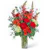 The warm glow of sunset is captured in this stunning arrangement. Garden
