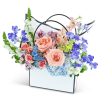The Monet Butterfly Garden Tote is a beautifully crafted flower arrangement, showcasing