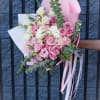 The &quot;Blush Elegance Bouquet&quot; is a sophisticated arrangement that exudes romance and