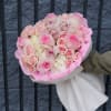 The Pink Harmony Bouquet is a stunning and romantic arrangement that captures