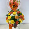 Two dozen autumn-colored roses, green balls, carnations and eucalyptus&hellip;in a balloon and