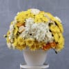 The flowers used in the arrangement can include a variety of yellow