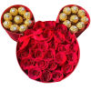 A modern flower arrangement in a Minnie box filled with roses &amp;