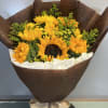 Wrapped Sunflowers
AS SIMILAR AS POSSIBLE 
Substitution based on season, flower availability, or