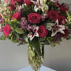 Stargazer Lillie&rsquo;s, Roses, Wax Flower , green hypericum berries , pink snap
