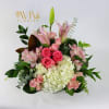 This pretty arrangement classically elegant delivered in gold or glass vase. 