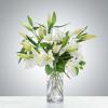 White lilies stand tall and beautiful. Send an impactful gift to somebody