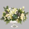 Simply unique, this gorgeous green and winter-white design is artfully hand-arranged in
