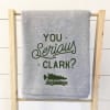 A holiday blanket with a holiday phrase, for the Christmas movie lover

Made