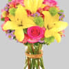 This bright and beautiful flower arrangement will brighten someone&#039;s day with a
