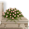 The Pink Tranquility Casket Spray is a classic design that can be
