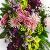 Soft lavender flowers - roses, fuji chrysanthemums, and asters - blend with