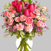 It&#039;s beauty-full! Bursting with tantalizing tulips and radiant roses, this delightful pink