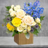 Like wispy clouds in a bright blue sky, this beautiful arrangement of