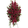 Express your heartfelt sympathies with this magnificent spray of all-red floral favorites.