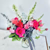 Our talented designers look forward to arranging a stunning floral arrangement using