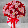A modern flower arrangement in a cylinder box filled with roses.

DETAILS
This cylinder