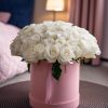 Experience luxury with our stunning white roses, beautifully arranged in a chic