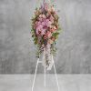 This abundant spray of soft, feminine spring colors feels as calming as