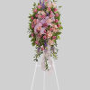 This abundant spray of soft, feminine spring colors feels as calming as
