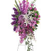 Blessed, peaceful rest is expressed in this cascading purple spray accented with