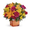 Spread sunshine with bold roses, cheerful lilies, and fluttering alstroemerias in this