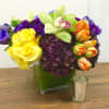 Here we present a colorful combination of anemone, dahlias, tulips, roses, pompoms