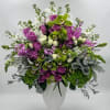  Al large composition of flowers using stocks, roses, cymbidiums orchids, hydrangeas.