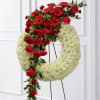 The Graceful Tribute Wreath creates a stunning presentation of love&#039;s serenity for