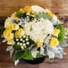 This uplifting bright and cheery arrangement is designed in a galvanized tin